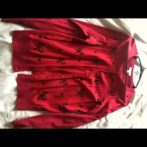 Red cardigan with bows